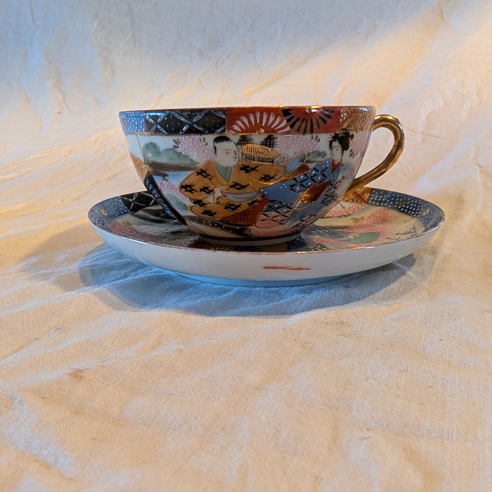 2/40$ Hand-Painted Japanese-Style Porcelain Tea Cup and Saucer - Multicolor